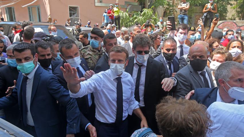 What is Macron looking for in the ruins of Beirut?
